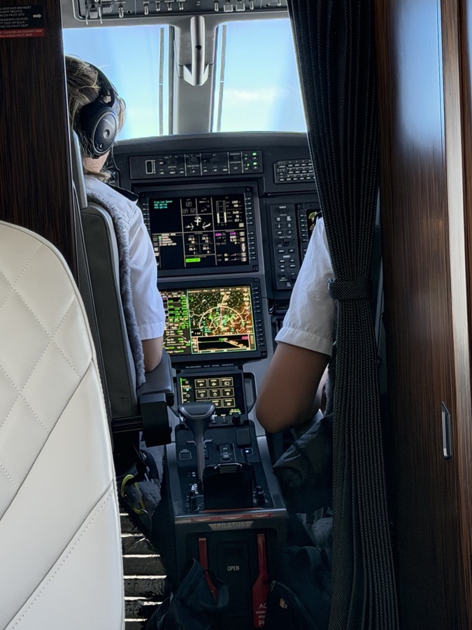 PC-12 flight deck viewed from the cabin